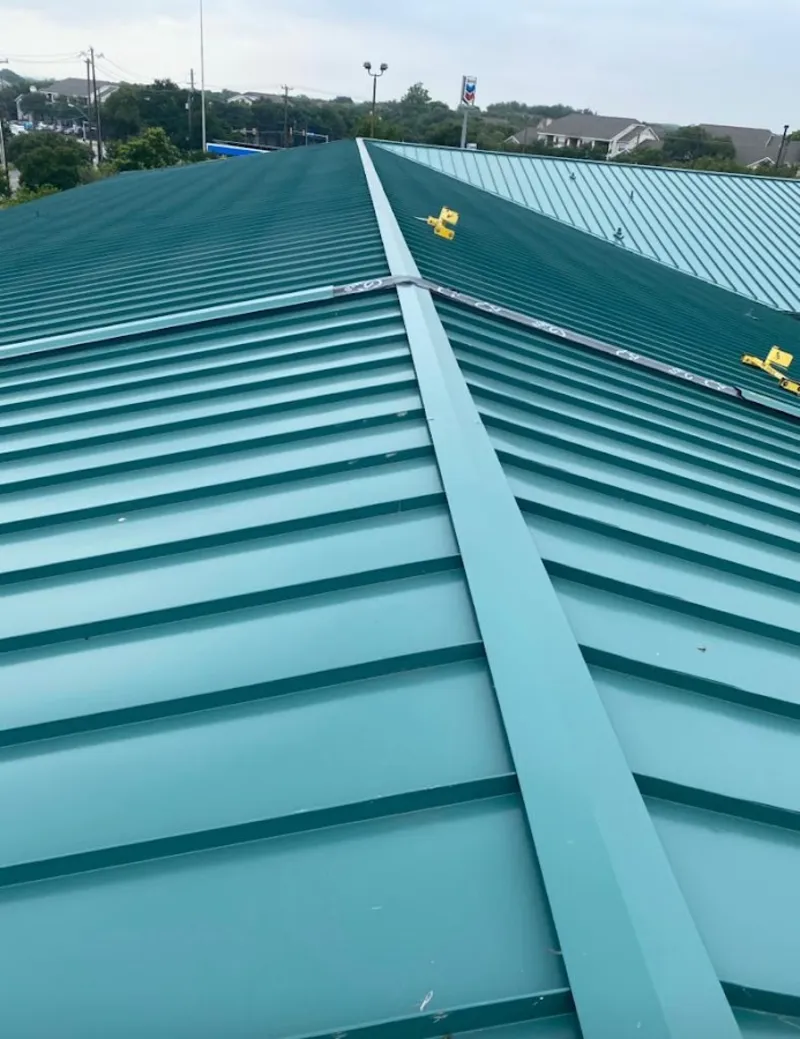 Green commercial metal roof ridge and valley for Metal Roof Repair in Gardner